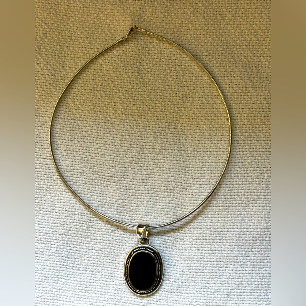 Silver costume jewellery- no stamp - black and silver pendent. Good condition